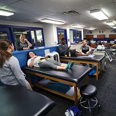 Students in the athletic training facility